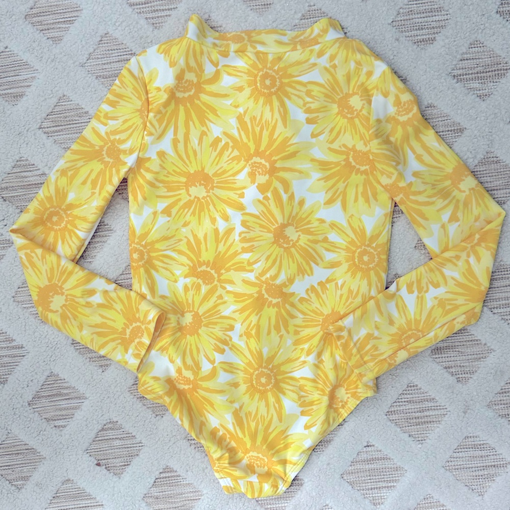 Carter’s long-sleeved, girls swimsuit